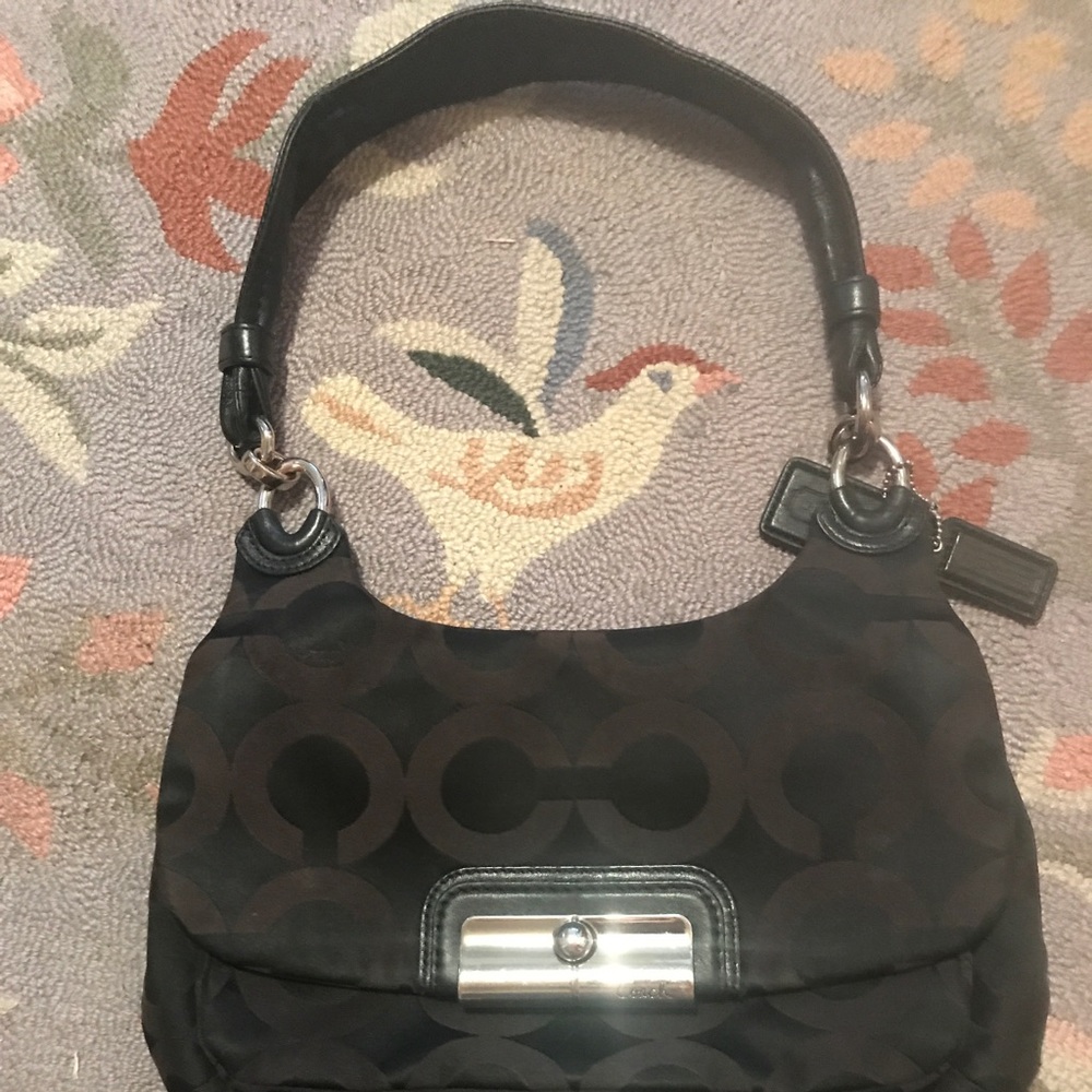 Black coach arm bag
